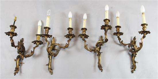 A set of four Louis XV style ormolu twin branch wall lights, H.15in.